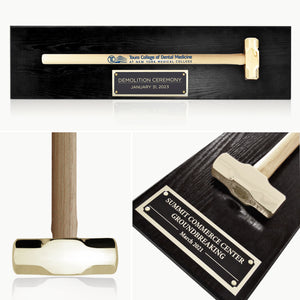 Full Size Gold Plated Sledgehammer Plaque - Black Finish. Gold sledgehammer on a black plaque with engraved text, to commemorate a demolition ceremony.