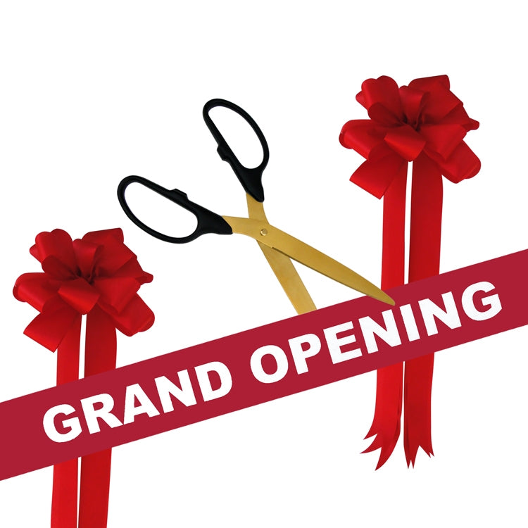 Grand opening, ribbon cut, overhead of gold scissors cutting red